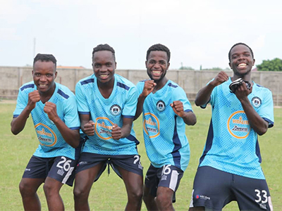 Chitipa United celebrating victory at Karonga Stadium